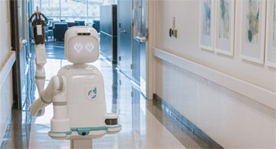 Moxi robot in a scientific constructing hallway. Image source: Diligent Robots.