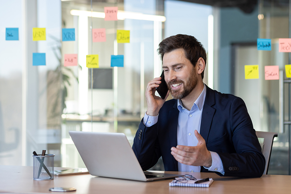 Sales expert talking on the phone.